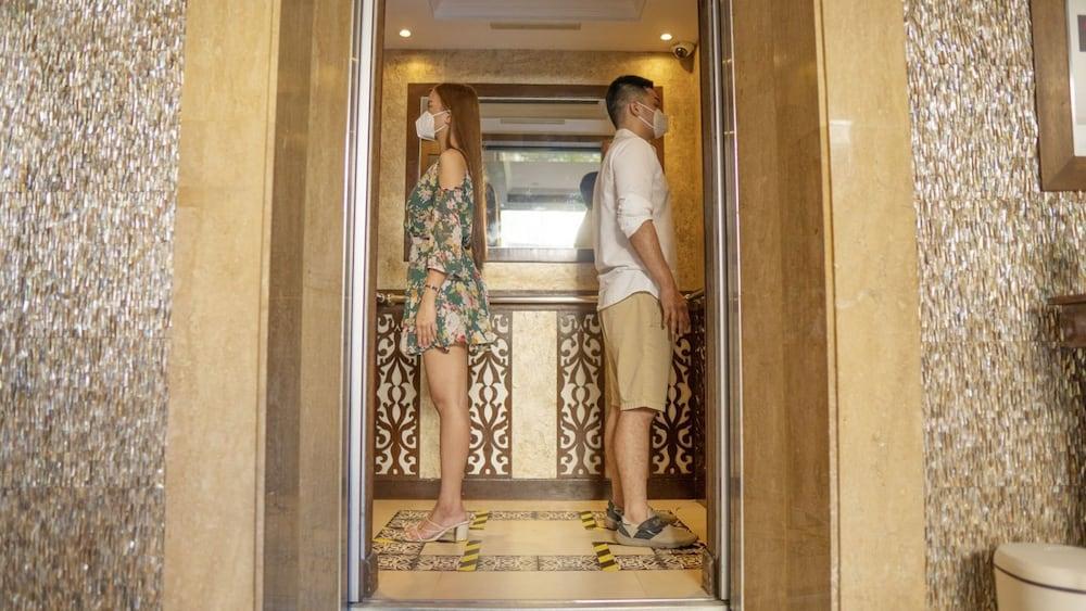 The Bellevue Resort Panglao Exterior photo Social distancing in an elevator