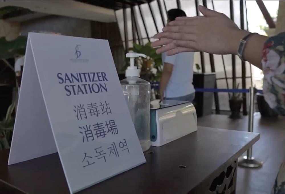 The Bellevue Resort Panglao Exterior photo A hand sanitizer station at a hotel in Seoul, South Korea