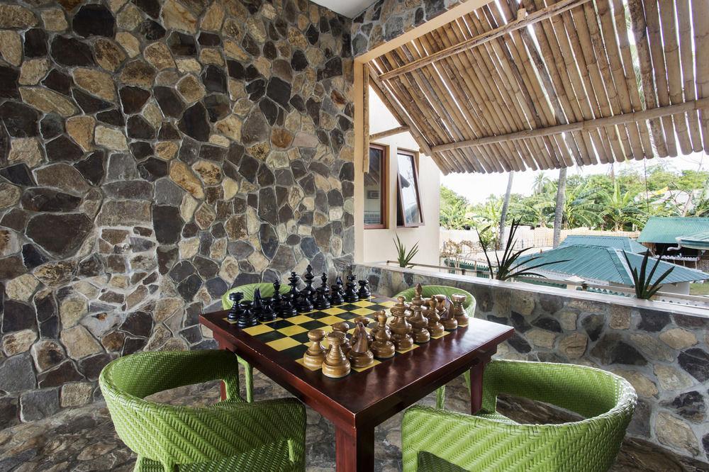 The Bellevue Resort Panglao Exterior photo A game of chess at the resort
